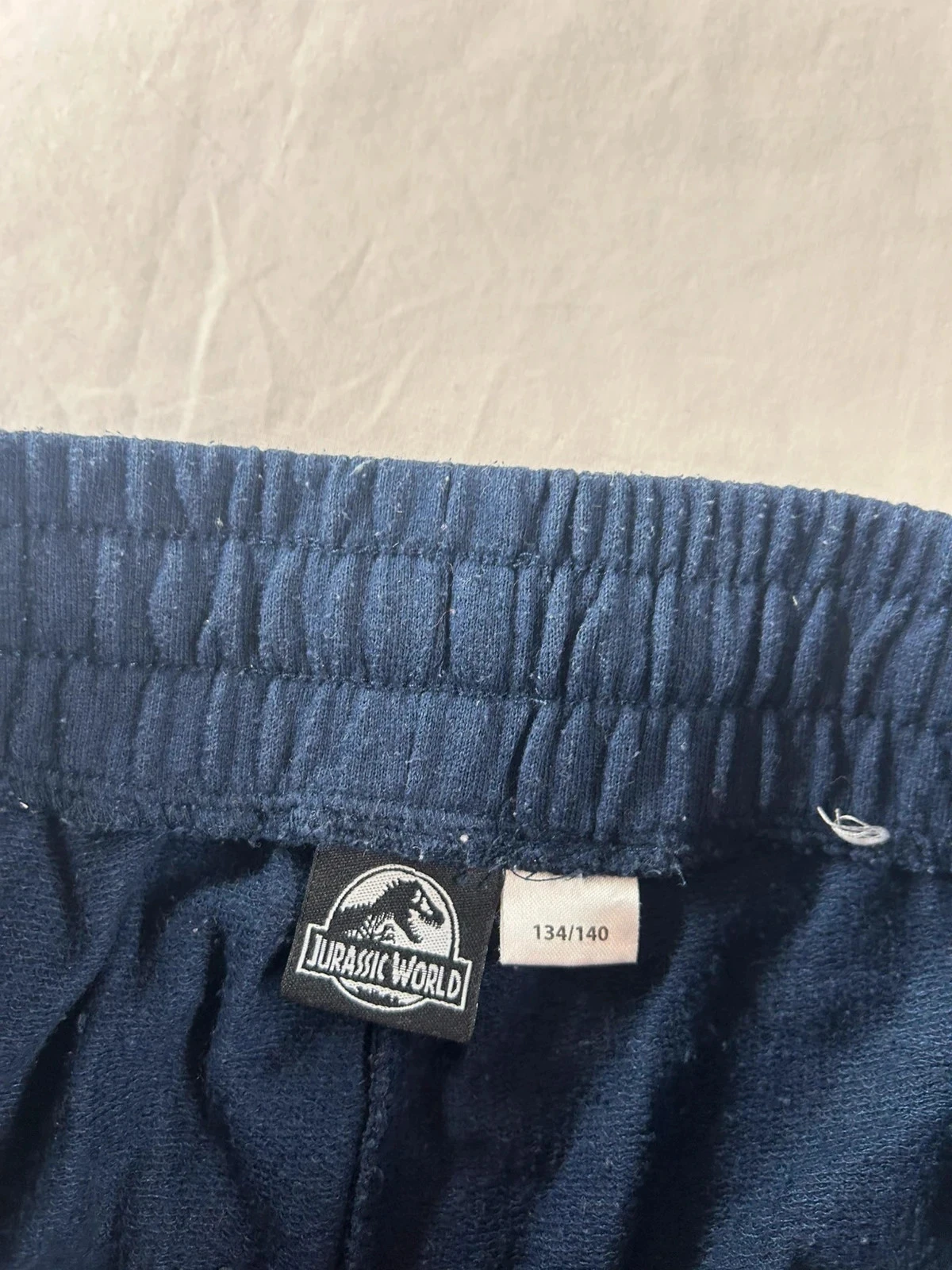 Calça azul marinho jurassic world – photo 8
